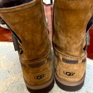 Uggs brown and dark brown short boots. Limited edition multi colored fur inside